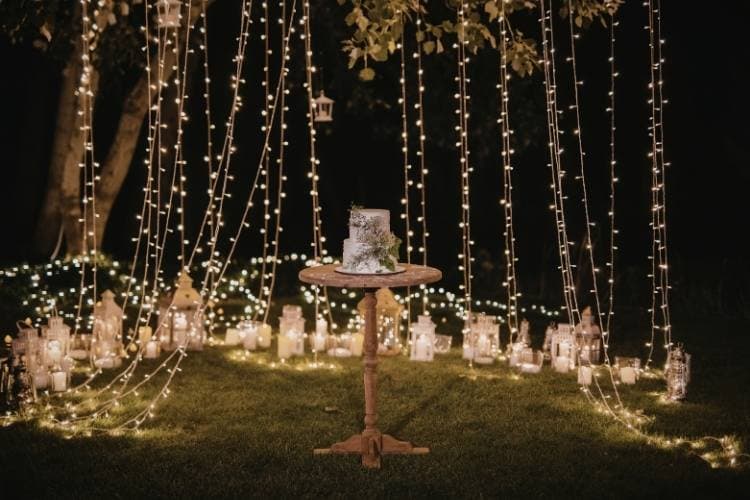 Beautiful string lights and lanterns create a warm, festive atmosphere for retirement parties.