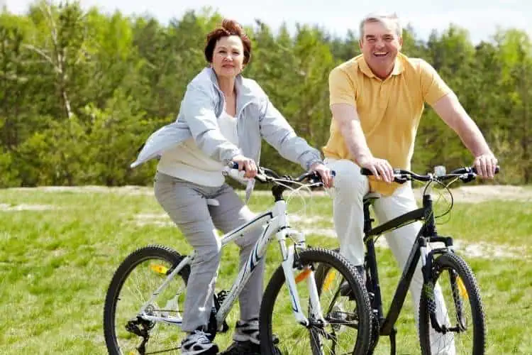 retired couple cycling