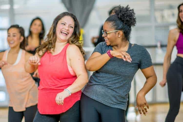 women dancing together